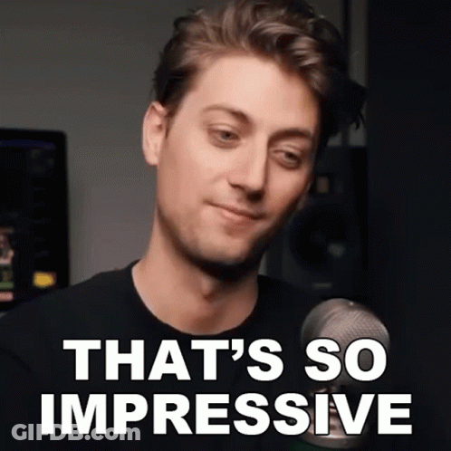 A Man In Front Of A Microphone With The Words That 'S So Impressive On His Face GIF