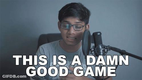 A Man In Front Of A Microphone With The Words This Is A Damn Good Game Above Him GIF