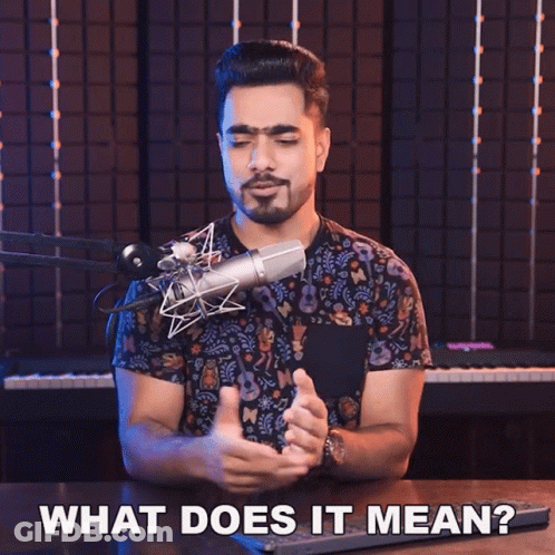 A Man In Front Of A Microphone With The Words What Does It Mean Below Him GIF