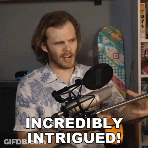 A Man In Front Of A Rode Microphone Is Saying " Incredibly Intrigued " GIF