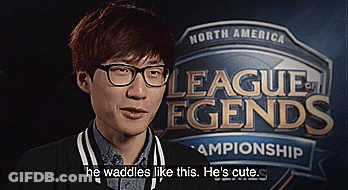 A Man In Front Of A Sign That Says North America League Legends Championship GIF