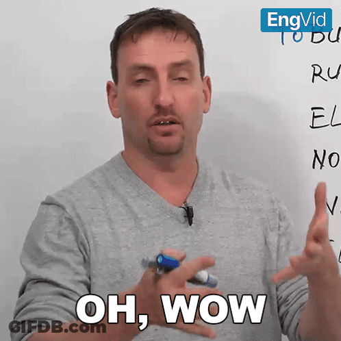A Man In Front Of A White Board With The Words Oh Wow Written On It GIF