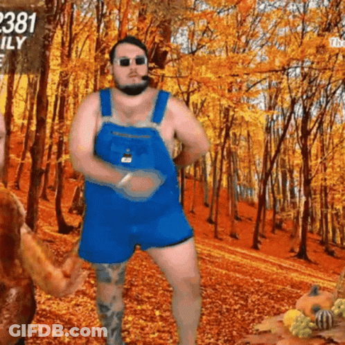 A Man In Overalls Is Dancing In Front Of A Sign That Says 2381 Family GIF