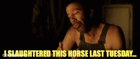 A Man In Overalls Is Eating A Piece Of Meat And Says `` I Slaughtered This Horse Last Tuesday ... '' GIF