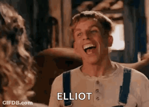 A Man In Overalls Is Laughing With A Woman In A Room . GIF