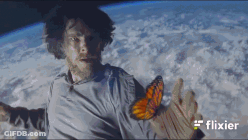 A Man In Space With The Word Flixier On The Bottom Left GIF