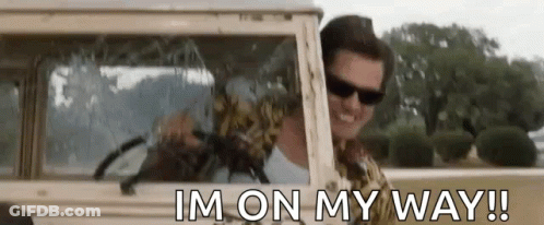 A Man In Sunglasses Is Getting Out Of A Car With A Spider On The Window And Says `` Im On My Way ! '' GIF
