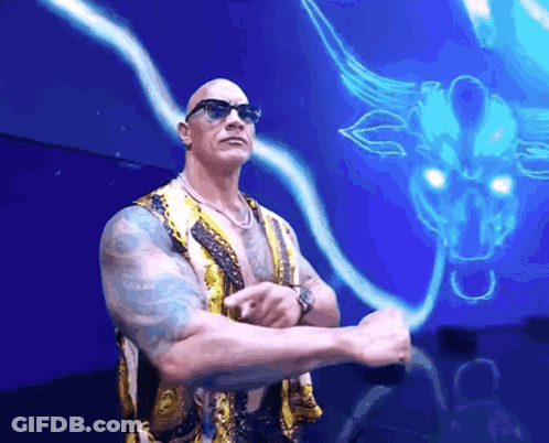 A Man In Sunglasses Stands In Front Of A Blue Bull GIF