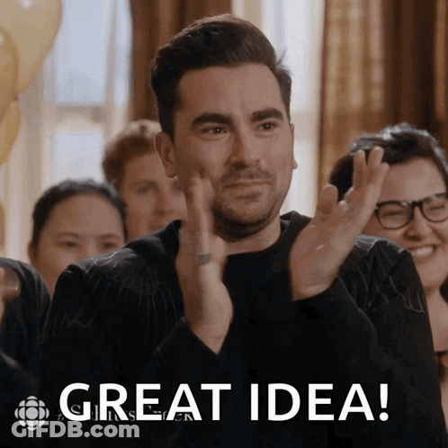 A Man Is Applauding With The Words Great Idea Behind Him GIF