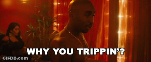 A Man Is Asking Why You Trippin ' On A Red Background GIF