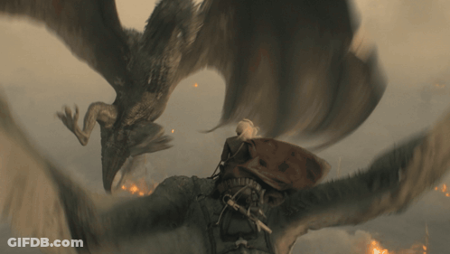 A Man Is Being Attacked By A Dragon In A Scene From A Movie GIF