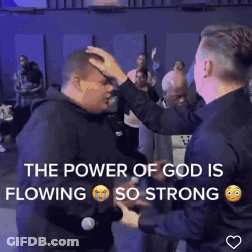 A Man Is Being Blessed By Another Man In A Video That Says " The Power Of God Is Flowing So Strong " GIF