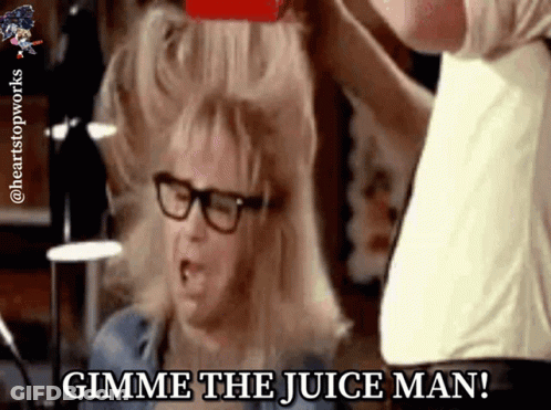 A Man Is Brushing A Woman 'S Hair And The Caption Says Gimme The Juice Man GIF