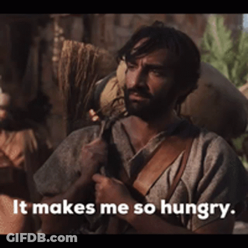 A Man Is Carrying A Bag On His Back And Says " It Makes Me So Hungry " GIF
