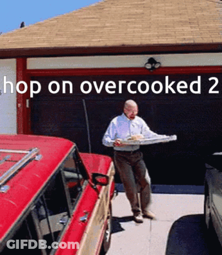A Man Is Carrying A Tray Of Food In Front Of A Garage Door That Says Hop On Over Cooked 2 GIF