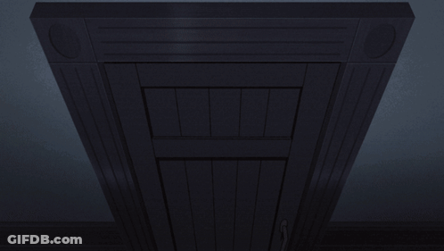 A Man Is Carrying A Woman In A Dark Room GIF