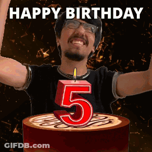 A Man Is Celebrating His 5Th Birthday With A Cake And Candle GIF