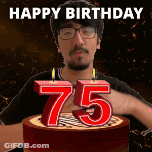 A Man Is Celebrating His 75Th Birthday By Blowing Out A Candle GIF