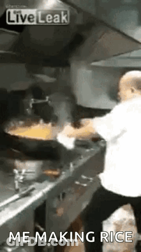 A Man Is Cooking Rice In A Wok In A Kitchen With The Words `` Me Making Rice '' Written Below Him . GIF