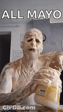 A Man Is Covered In Mayonnaise And Is Holding A Bottle Of Mayonnaise . GIF