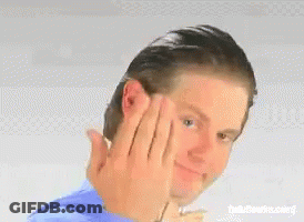 A Man Is Covering His Ear With His Hands And Making A Funny Face . GIF