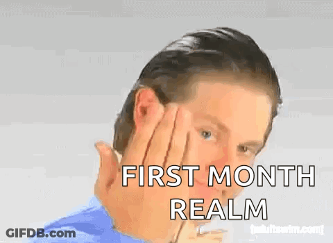 A Man Is Covering His Face With His Hand And The Words First Month Realm Are On The Bottom GIF