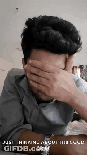 A Man Is Covering His Face With His Hands And The Words Just Thinking About It Good Grief GIF