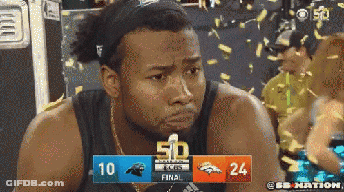 A Man Is Crying In Front Of A Scoreboard That Says 50 GIF