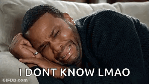 A Man Is Crying While Laying On A Couch And Says `` I Dont Know Lmao '' . GIF