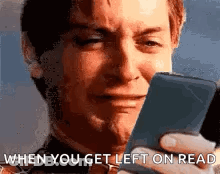 A Man Is Crying While Looking At A Cell Phone And Says `` When You Get Left On Read '' . GIF