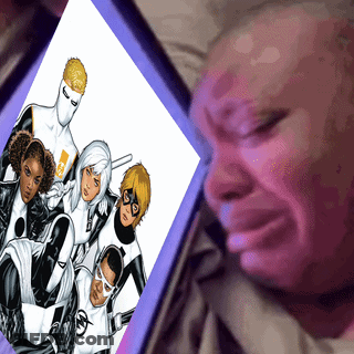 A Man Is Crying While Looking At A Comic Book GIF