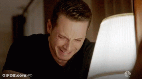 A Man Is Crying While Looking At A Laptop Screen With The Hashtag #Chicagopd On It GIF