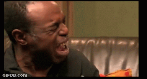 Man Crying Sitting On Couch GIF