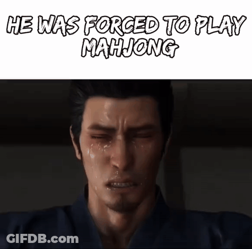 A Man Is Crying With The Words He Was Forced To Play Mahjong Written Above Him GIF