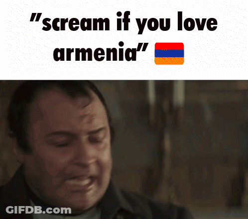 A Man Is Crying With The Words " Scream If You Love Armenia " Written Above Him GIF