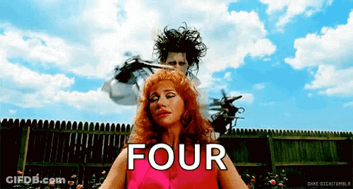 A Man Is Cutting A Woman 'S Hair And The Word Four Is On The Bottom GIF