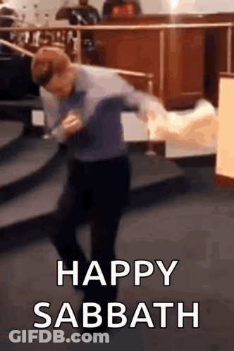 A Man Is Dancing In A Church With The Words `` Happy Sabbath '' Above Him . GIF