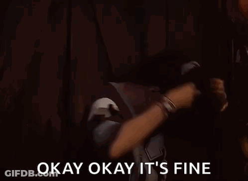 A Man Is Dancing In A Dark Room With The Words `` Okay Okay It 'S Fine '' Written On The Screen . GIF