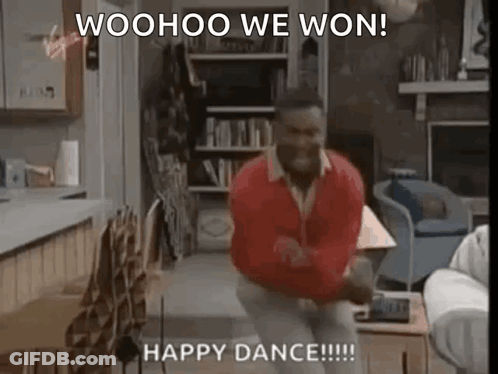 A Man Is Dancing In A Living Room With The Words `` Woohoo We Won ! Happy Dance ! '' GIF