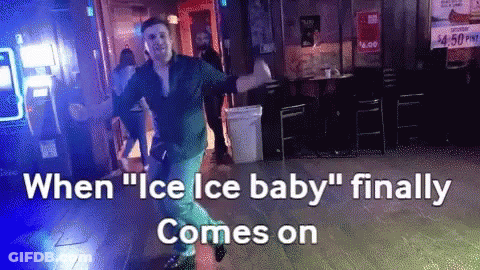 A Man Is Dancing In A Room With The Words " When Ice Ice Baby " Finally Comes On GIF