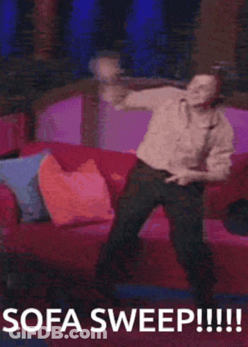 A Man Is Dancing In Front Of A Couch With The Words Sofa Sweep !!! Below Him GIF