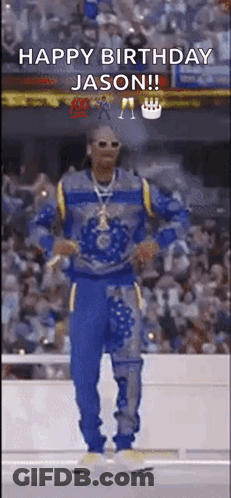 A Man Is Dancing In Front Of A Crowd With The Words `` Happy Birthday Jason '' Written On It . GIF
