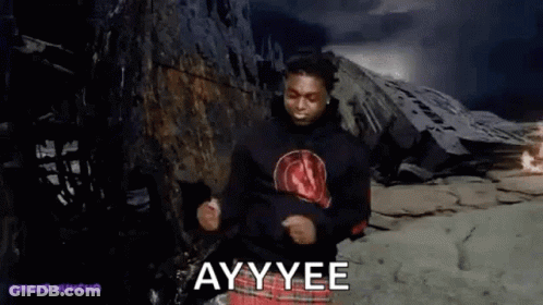 A Man Is Dancing In Front Of A Mountain With The Words Ayy Yee Written On The Screen . GIF