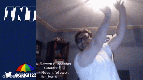 A Man Is Dancing In Front Of A Sign That Says ' Int ' On It GIF