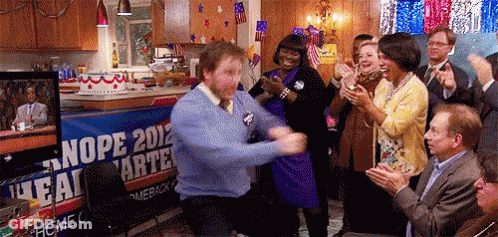 A Man Is Dancing In Front Of A Sign That Says Nope 2012 Cartel GIF
