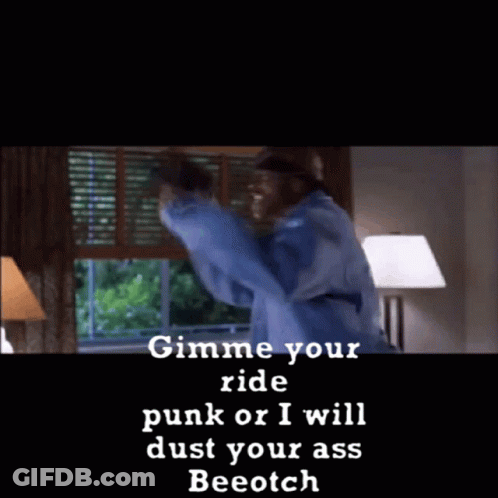 A Man Is Dancing In Front Of A Window With The Words " Gimme Your Ride Punk Or I Will Dust Your Ass Beeotch " GIF