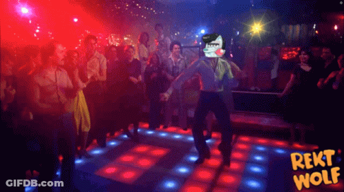 A Man Is Dancing On A Dance Floor With A Sign That Says ' Reiki Wolf ' GIF
