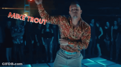 A Man Is Dancing On A Dance Floor With The Name Mike Trout Written Above Him GIF