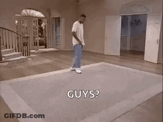 A Man Is Dancing On A Rug In A Living Room While Holding A Tennis Racquet . GIF