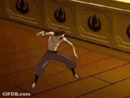 A Man Is Dancing On A Wooden Floor In Front Of A Wall With Fire Symbols . GIF